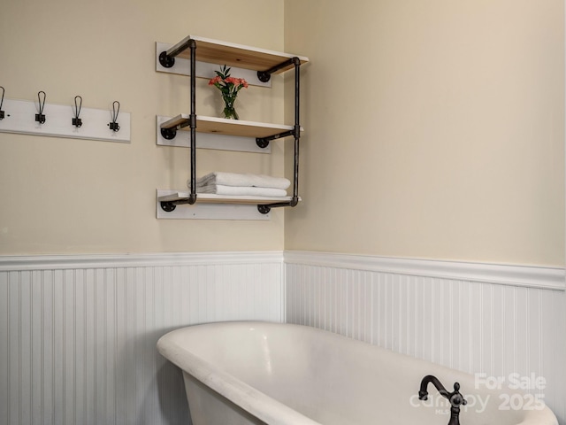 345 Bob Barnwell Rd, Fletcher, NC 28732 - bathroom with a freestanding tub and a wainscoted wall