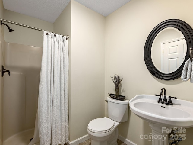 345 Bob Barnwell Rd, Fletcher, NC 28732 - bathroom with a shower stall and a textured ceiling