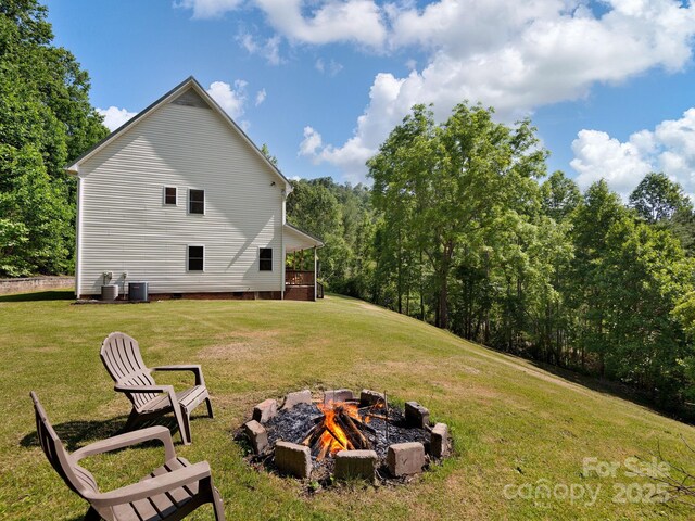 345 Bob Barnwell Rd, Fletcher, NC 28732 - view of green lawn featuring an outdoor fire pit
