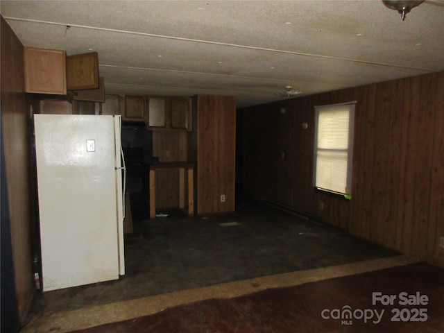 2927 S NC-16 Hwy, Newton, NC 28658 - kitchen with freestanding refrigerator and wood walls