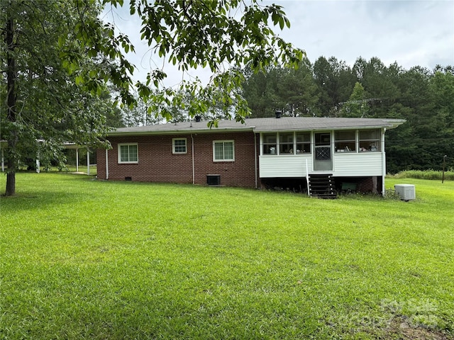 2350 Grubb Ferry Rd, Salisbury, NC 28144 - back of house with a sunroom, a yard, and crawl space