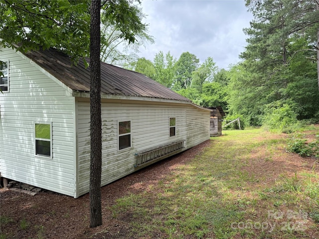 2350 Grubb Ferry Rd, Salisbury, NC 28144 - view of side of home with a metal roof