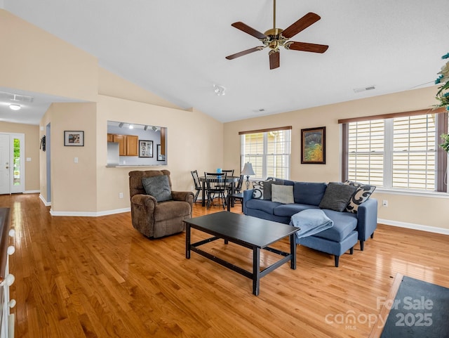 114 Fairway View Dr, Etowah, NC 28729 - living room featuring light wood-type flooring, a ceiling fan, and high vaulted ceiling