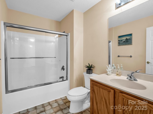 114 Fairway View Dr, Etowah, NC 28729 - bathroom featuring vanity, bath / shower combo with glass door, and a textured ceiling