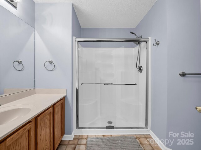 114 Fairway View Dr, Etowah, NC 28729 - full bathroom with a shower stall, vanity, and a textured ceiling