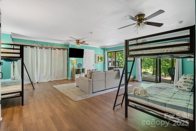37 Poplar Dr, Rosman, NC 28772 - bedroom with wood finished floors, access to exterior, and a ceiling fan