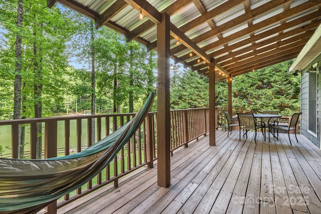 37 Poplar Dr, Rosman, NC 28772 - wooden terrace featuring outdoor dining area and view of wooded area