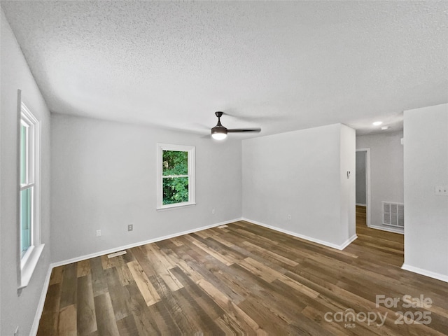 232 Branchwood Cir, Kings Mountain, NC 28086 - spare room with dark wood finished floors, a textured ceiling, and ceiling fan