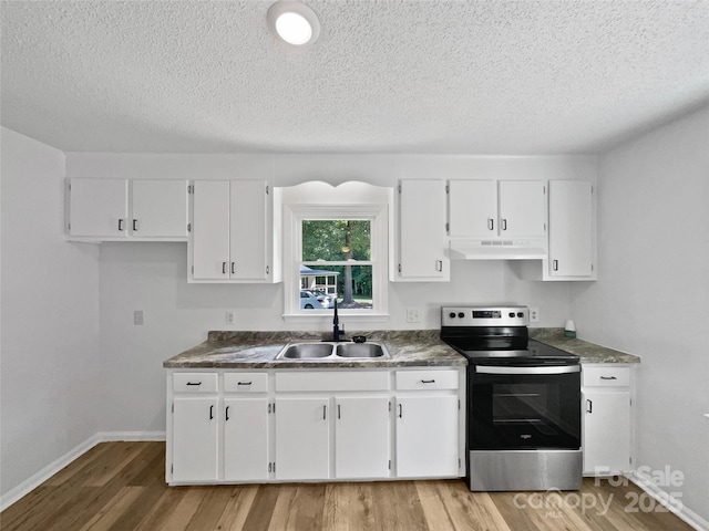 232 Branchwood Cir, Kings Mountain, NC 28086 - kitchen featuring stainless steel range with electric stovetop, under cabinet range hood, a textured ceiling, white cabinets, and light wood finished floors