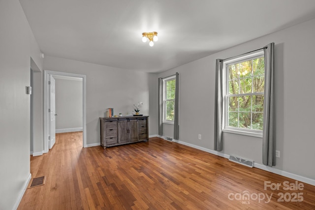 2 Enka Orchard St Unit 21A, Candler, NC 28715 - spare room with hardwood / wood-style floors and baseboards