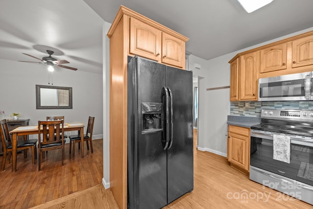 2 Enka Orchard St Unit 21A, Candler, NC 28715 - kitchen with appliances with stainless steel finishes, light wood-style flooring, tasteful backsplash, and a ceiling fan
