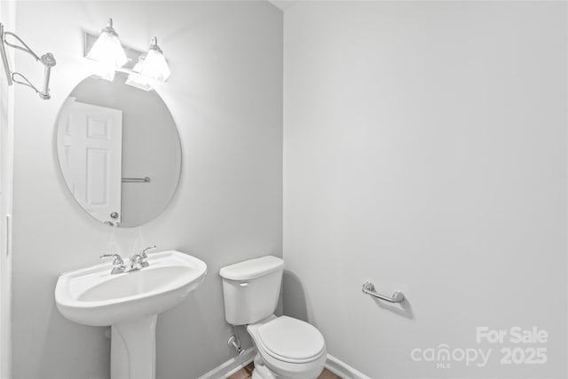 12452 Stratfield Place Cir, Pineville, NC 28134 - bathroom with toilet and a sink
