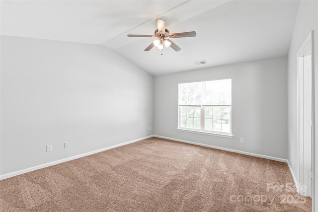12452 Stratfield Place Cir, Pineville, NC 28134 - carpeted empty room with vaulted ceiling and a ceiling fan