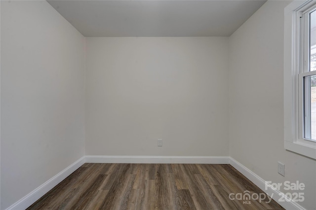 238 Lincoln Dr, Forest City, NC 28043 - spare room featuring dark wood-type flooring