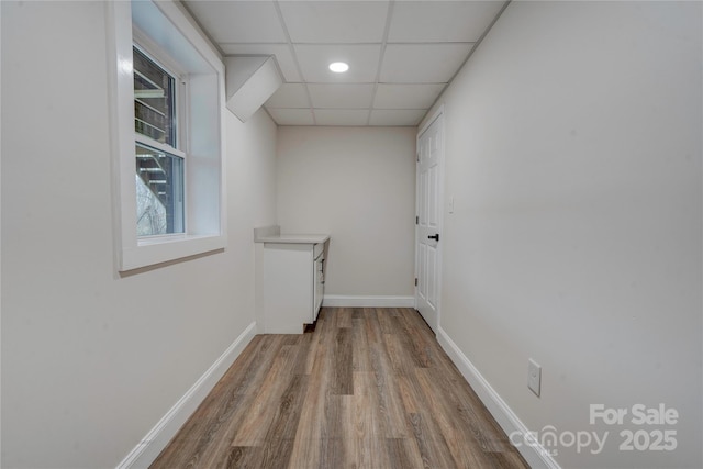 238 Lincoln Dr, Forest City, NC 28043 - empty room with wood finished floors, a paneled ceiling, and recessed lighting