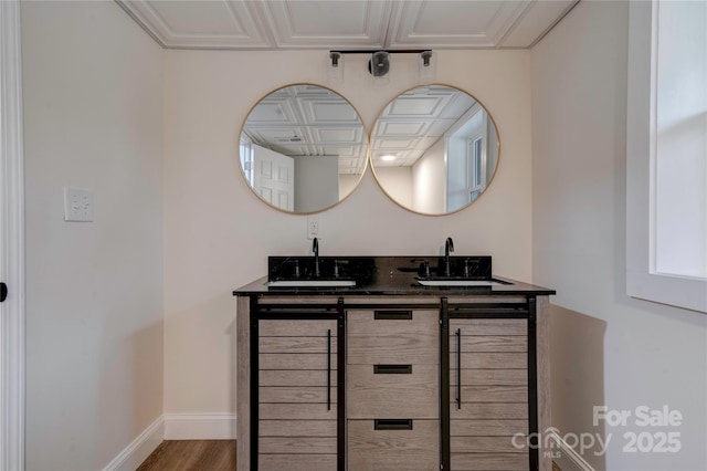 238 Lincoln Dr, Forest City, NC 28043 - full bathroom featuring double vanity and wood finished floors