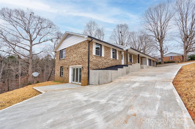 238 Lincoln Dr, Forest City, NC 28043 - view of property exterior with brick siding and driveway