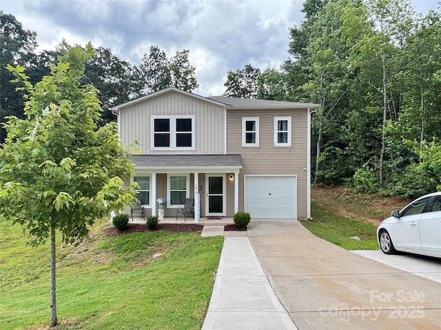 1916 Country Way, Hickory, NC 28601 - traditional-style home featuring covered porch, driveway, a front yard, a garage, and board and batten siding