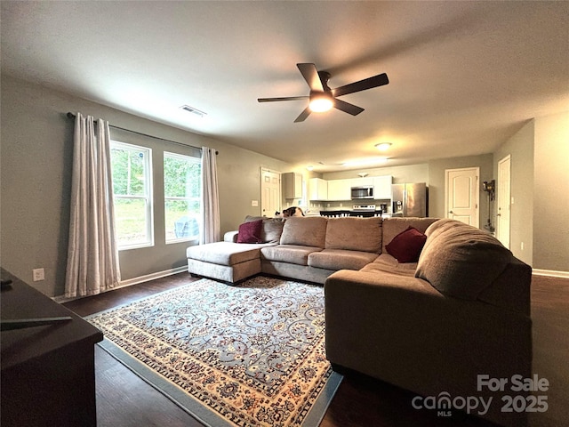 1916 Country Way, Hickory, NC 28601 - living area featuring a ceiling fan and dark wood-type flooring