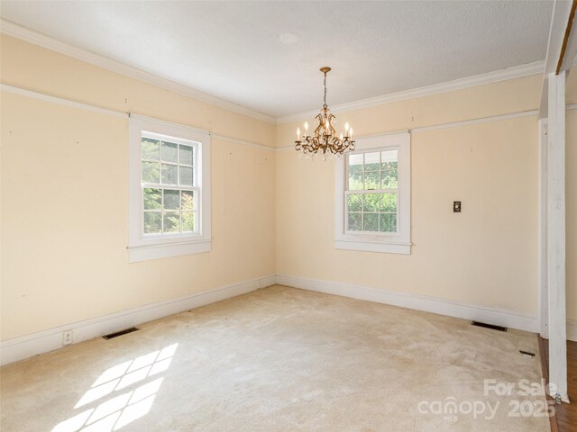 34 Lockhart Rd, Tryon, NC 28782 - spare room with a chandelier, carpet flooring, and crown molding