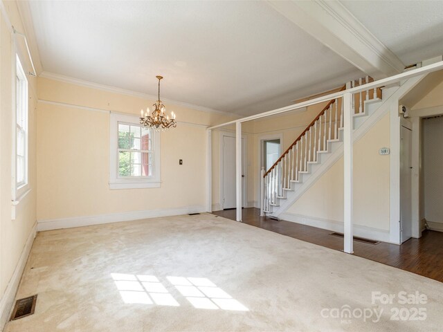 34 Lockhart Rd, Tryon, NC 28782 - unfurnished living room featuring stairway, carpet floors, a chandelier, and ornamental molding