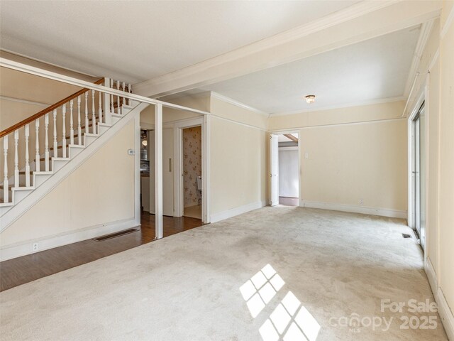 34 Lockhart Rd, Tryon, NC 28782 - unfurnished living room with carpet, stairs, and ornamental molding