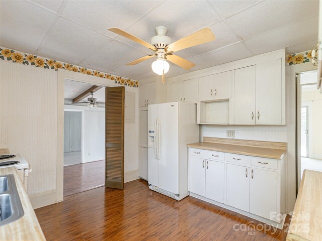 34 Lockhart Rd, Tryon, NC 28782 - kitchen with white fridge with ice dispenser, a ceiling fan, wood finished floors, light countertops, and white cabinetry