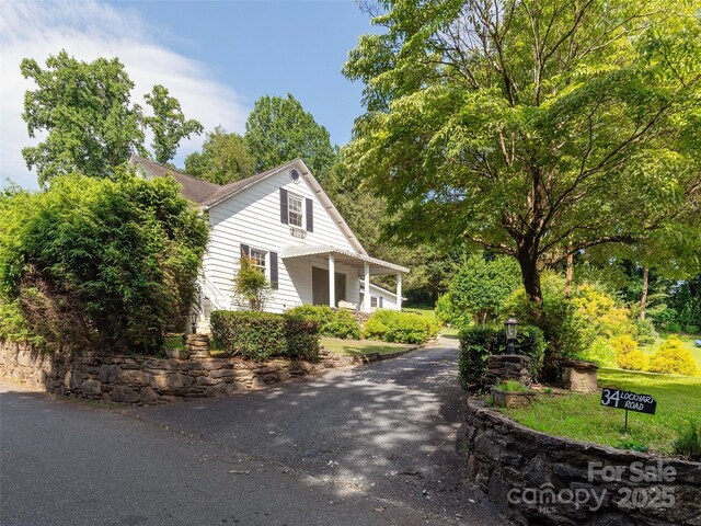 34 Lockhart Rd, Tryon, NC 28782 - view of property exterior featuring a porch