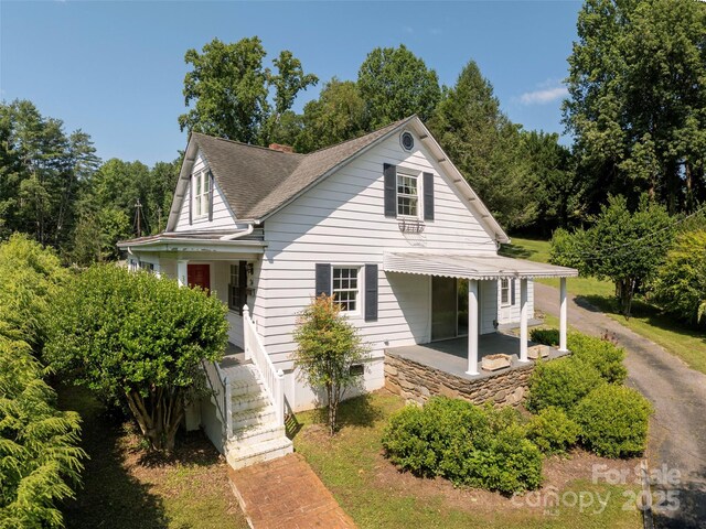 34 Lockhart Rd, Tryon, NC 28782 - view of front of property with roof with shingles and covered porch