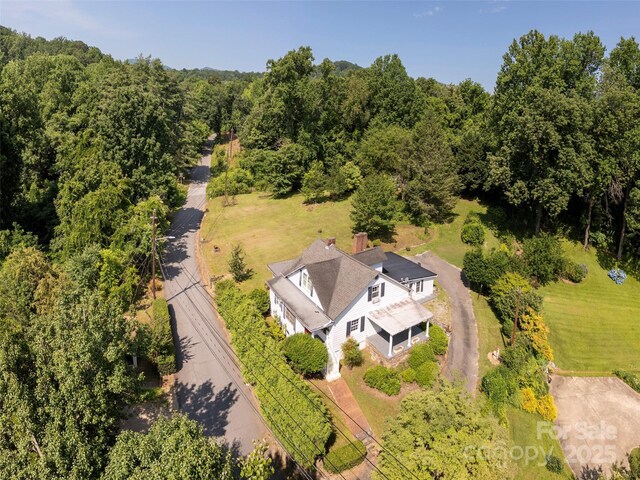 34 Lockhart Rd, Tryon, NC 28782 - aerial view of property and surrounding area featuring a heavily wooded area