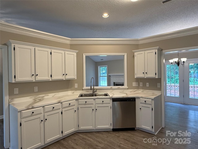 4402 Poxon Ln, Monroe, NC 28110 - kitchen featuring dishwasher, a chandelier, white cabinetry, ornamental molding, and dark wood finished floors