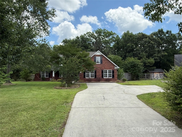 4402 Poxon Ln, Monroe, NC 28110 - view of front facade with driveway and brick siding