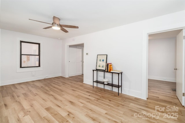 13414 Central Ave, Huntersville, NC 28078 - empty room featuring a ceiling fan and wood finished floors