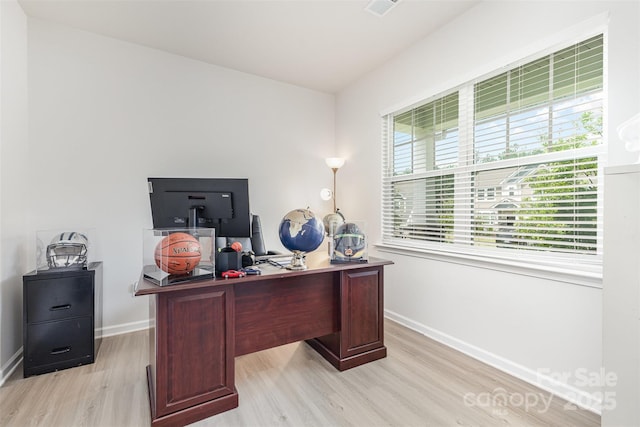205 Falls Cove Dr, Troutman, NC 28166 - home office with light wood-style floors and baseboards