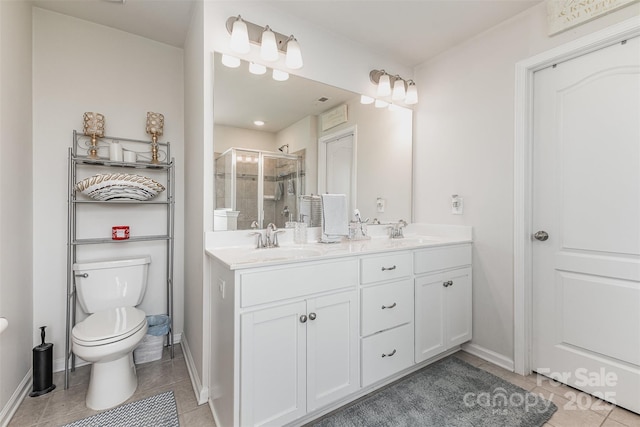 205 Falls Cove Dr, Troutman, NC 28166 - full bathroom with tile patterned flooring, double vanity, and a shower stall
