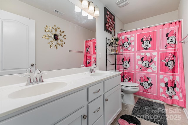 205 Falls Cove Dr, Troutman, NC 28166 - bathroom with double vanity, tile patterned flooring, and curtained shower