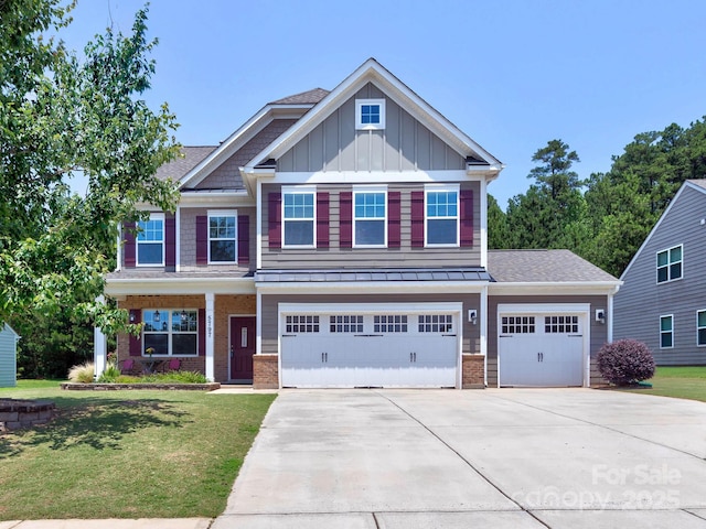 5797 Mcclintock Dr, Denver, NC 28037 - craftsman-style home with board and batten siding, concrete driveway, a front yard, and an attached garage