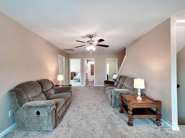 5797 Mcclintock Dr, Denver, NC 28037 - carpeted living room featuring ceiling fan and baseboards