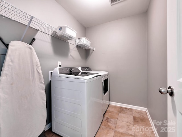 5797 Mcclintock Dr, Denver, NC 28037 - laundry room featuring separate washer and dryer and baseboards