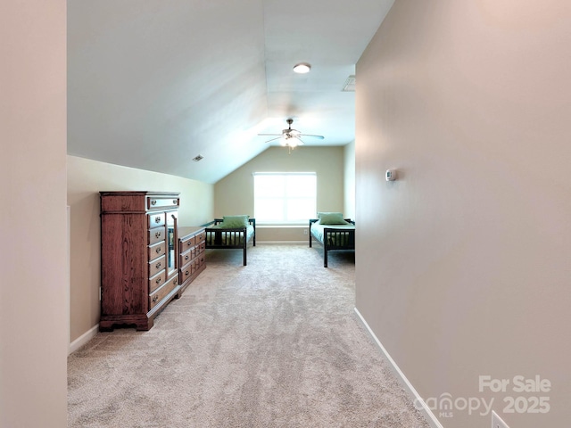 5797 Mcclintock Dr, Denver, NC 28037 - bedroom with lofted ceiling and light colored carpet