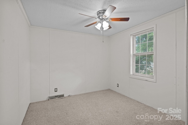 200 Southwood Park Rd, Mooresville, NC 28117 - empty room featuring carpet floors, ceiling fan, and a textured ceiling