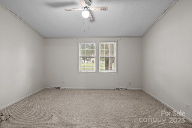 200 Southwood Park Rd, Mooresville, NC 28117 - spare room with a ceiling fan, carpet flooring, and a textured ceiling
