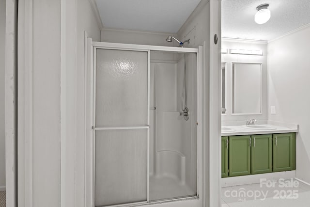 200 Southwood Park Rd, Mooresville, NC 28117 - full bath with a shower stall, crown molding, double vanity, and a textured ceiling