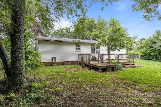 200 Southwood Park Rd, Mooresville, NC 28117 - back of house featuring a wooden deck, crawl space, and a yard
