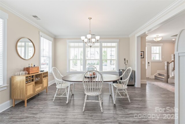257 Auburn View Rd, Rock Hill, SC 29730 - dining area featuring ornamental molding, wood finished floors, a chandelier, and stairway