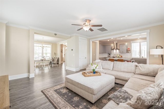 257 Auburn View Rd, Rock Hill, SC 29730 - living area featuring ornamental molding, dark wood-style floors, a chandelier, and ceiling fan