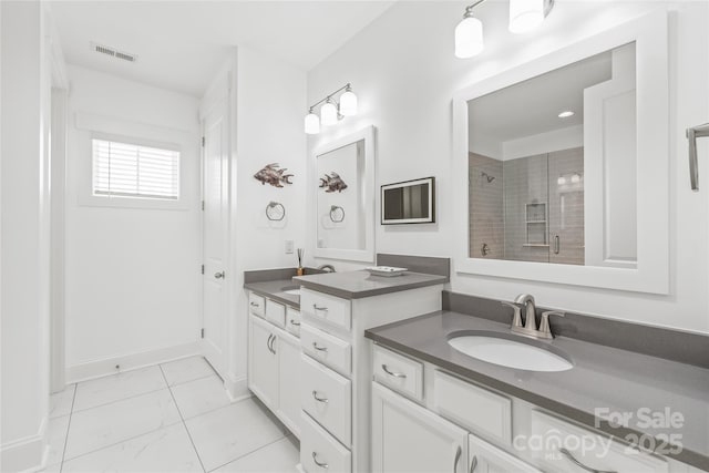 257 Auburn View Rd, Rock Hill, SC 29730 - bathroom featuring a stall shower, two vanities, and marble finish flooring