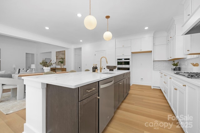 4032 Brandy Creek Ct, Clover, SC 29710 - kitchen featuring stainless steel appliances, white cabinetry, light wood-type flooring, recessed lighting, and tasteful backsplash