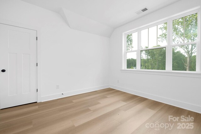 4032 Brandy Creek Ct, Clover, SC 29710 - unfurnished bedroom featuring lofted ceiling and light wood-style floors