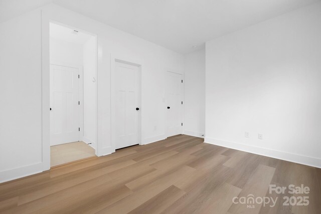 4032 Brandy Creek Ct, Clover, SC 29710 - unfurnished bedroom with wood finished floors and baseboards